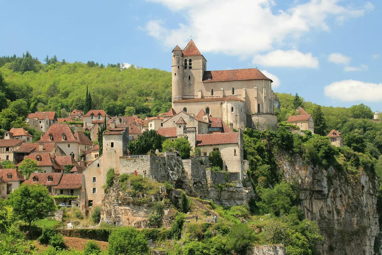 Saint-Cirq-Lapopie clinging to the cliff above the valley