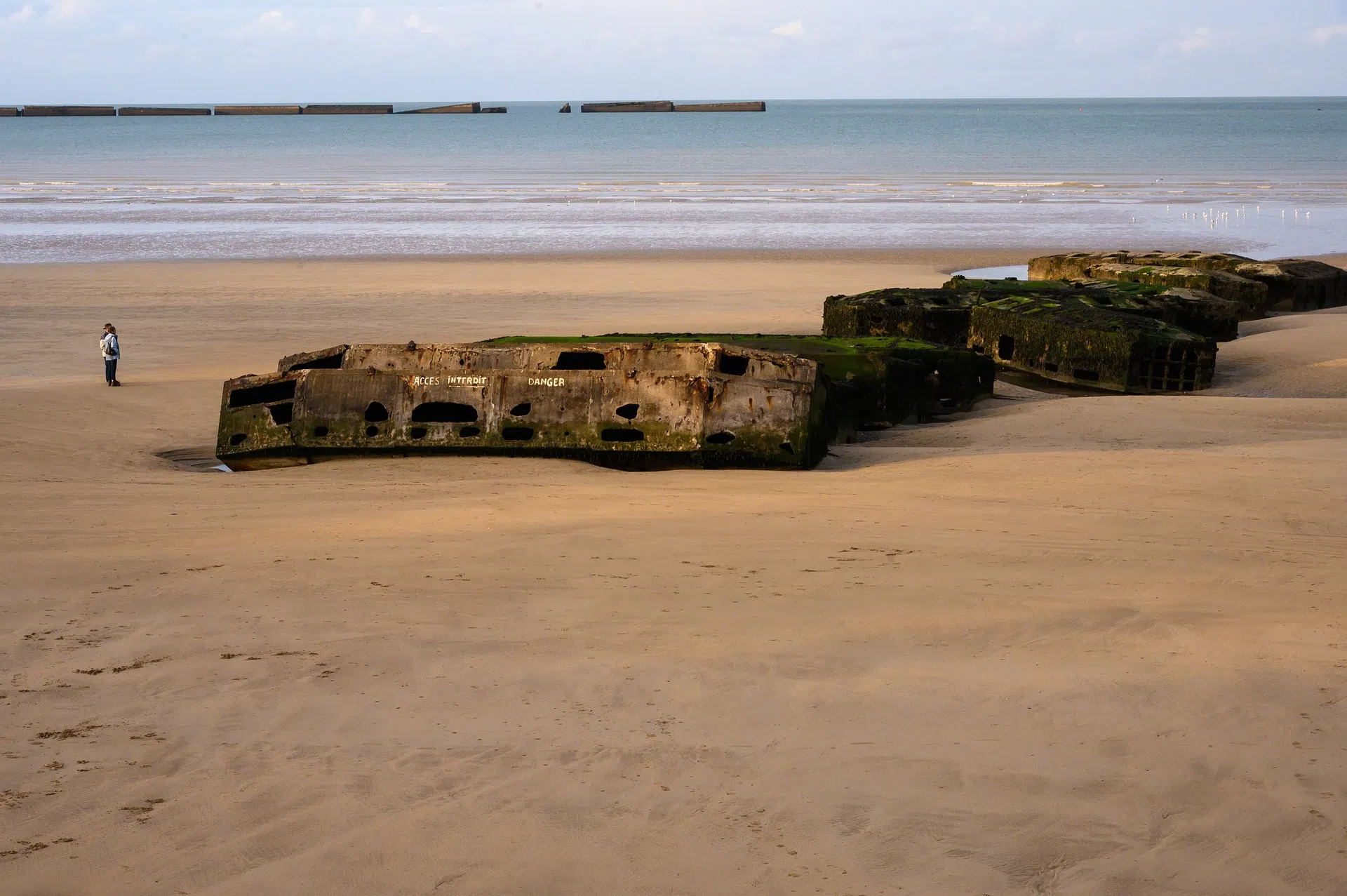 The remains of the Mulberry artificial harbor off the coast of Arromanches-les-Bains