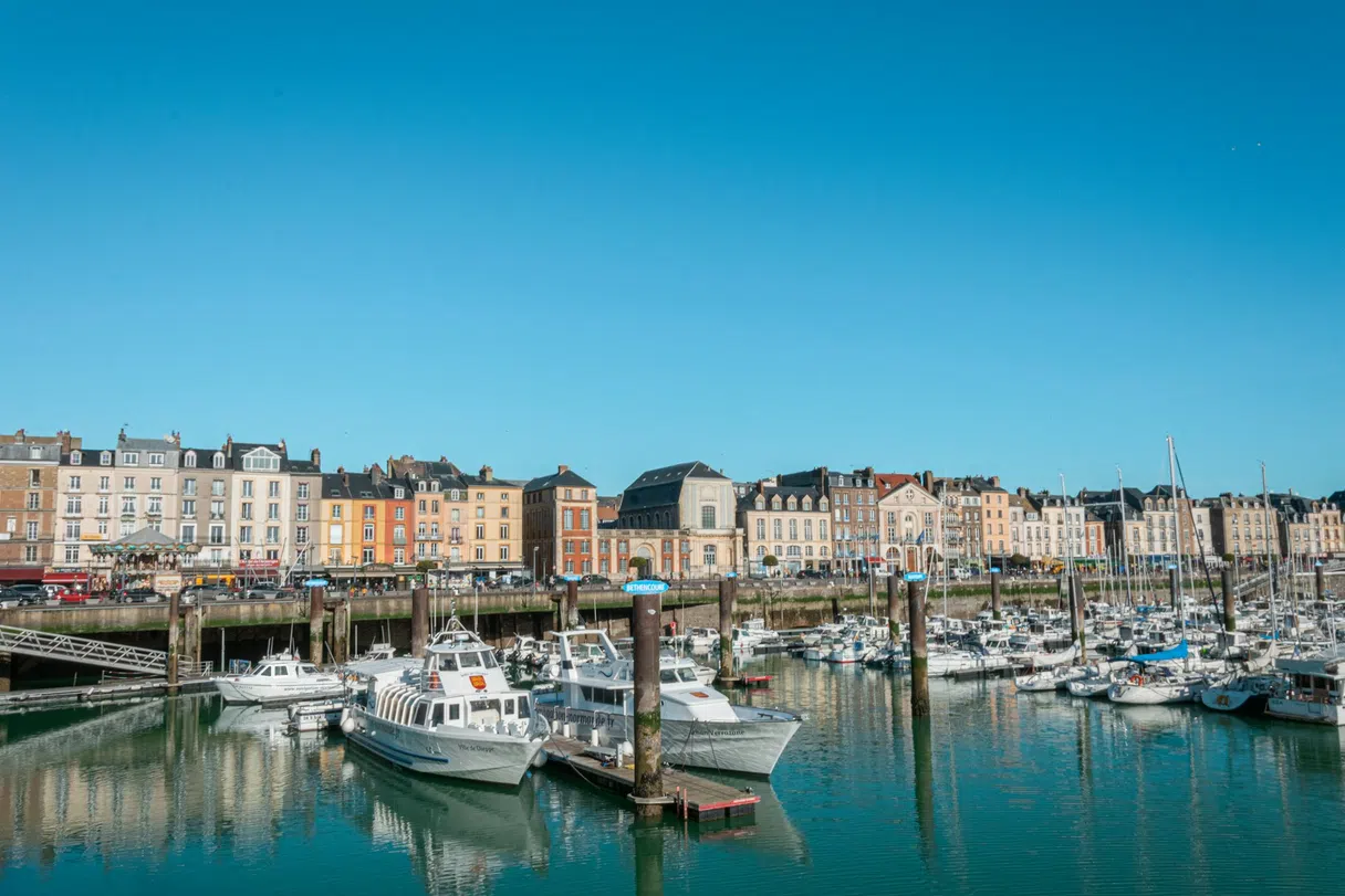 The port of Dieppe with boats and waterfront buildings