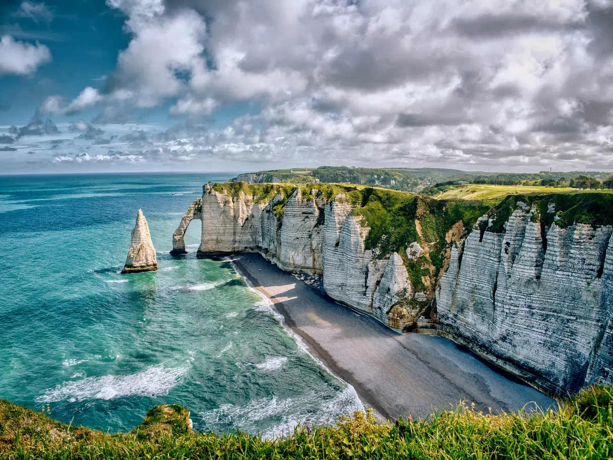 Étretat cliffs above the sea, clear light on the Normandy coast