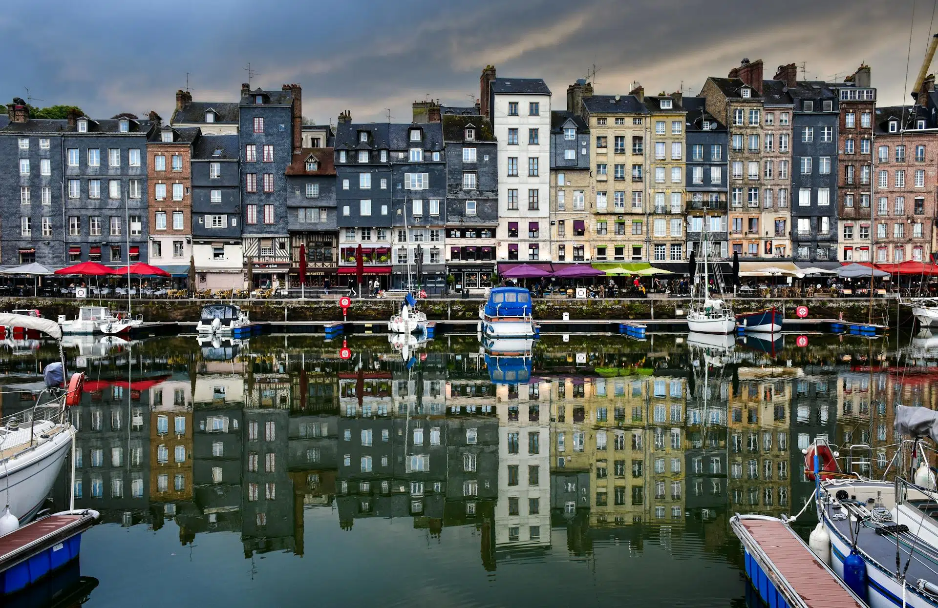 Normandy harbor and coastline illustrating the best areas to stay in Normandy