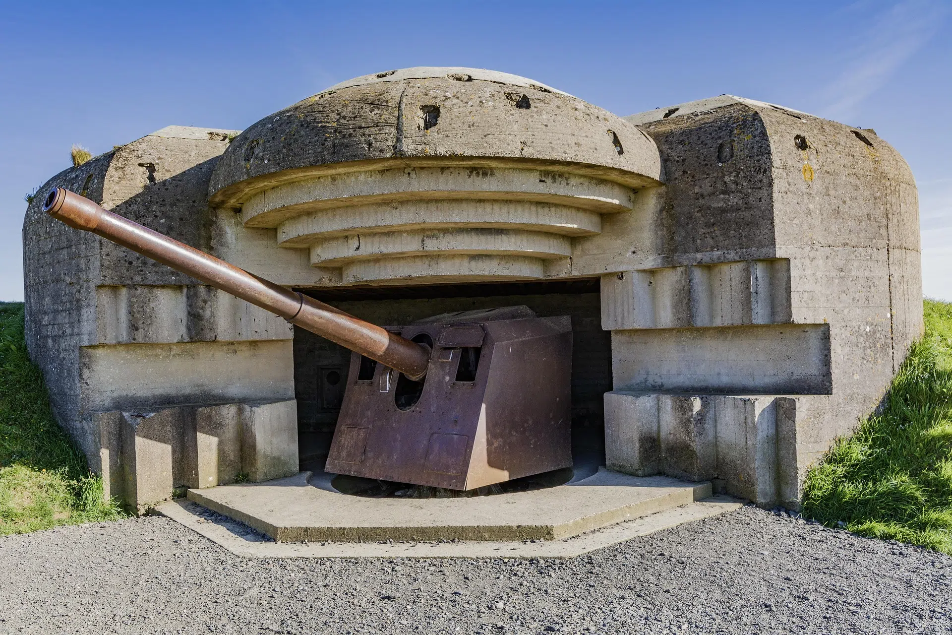 A casemate and its cannon in Longues-sur-Mer facing the coast