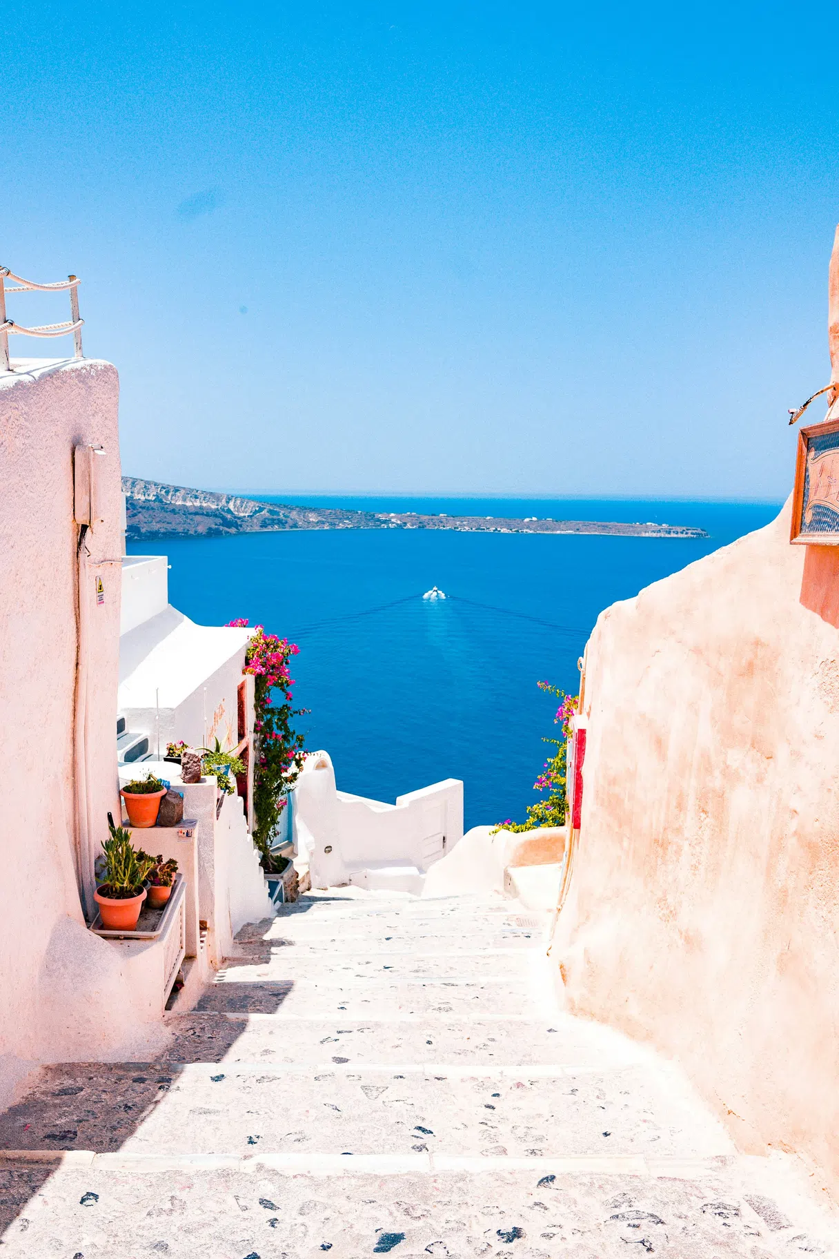 Sunny panoramic view of the French Mediterranean coast in Nice, with turquoise water and colourful buildings