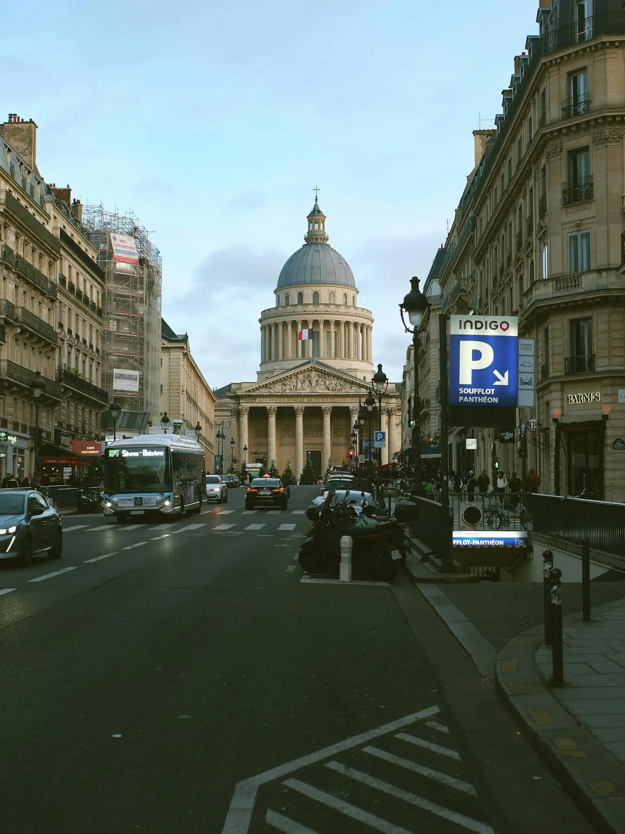 Parisian street with an underground parking sign