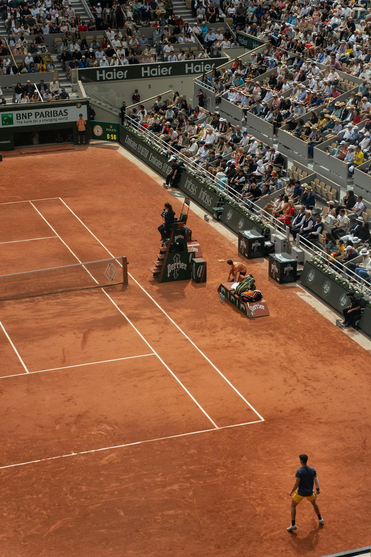 A tennis match on the clay courts at Roland-Garros in Paris