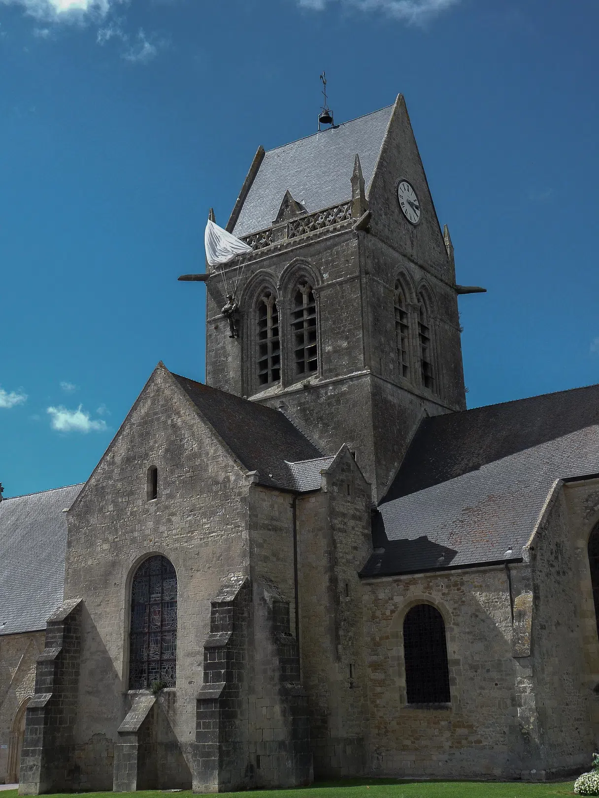 The church tower at Sainte-Mère-Église with the paratrooper figure hanging from the spire