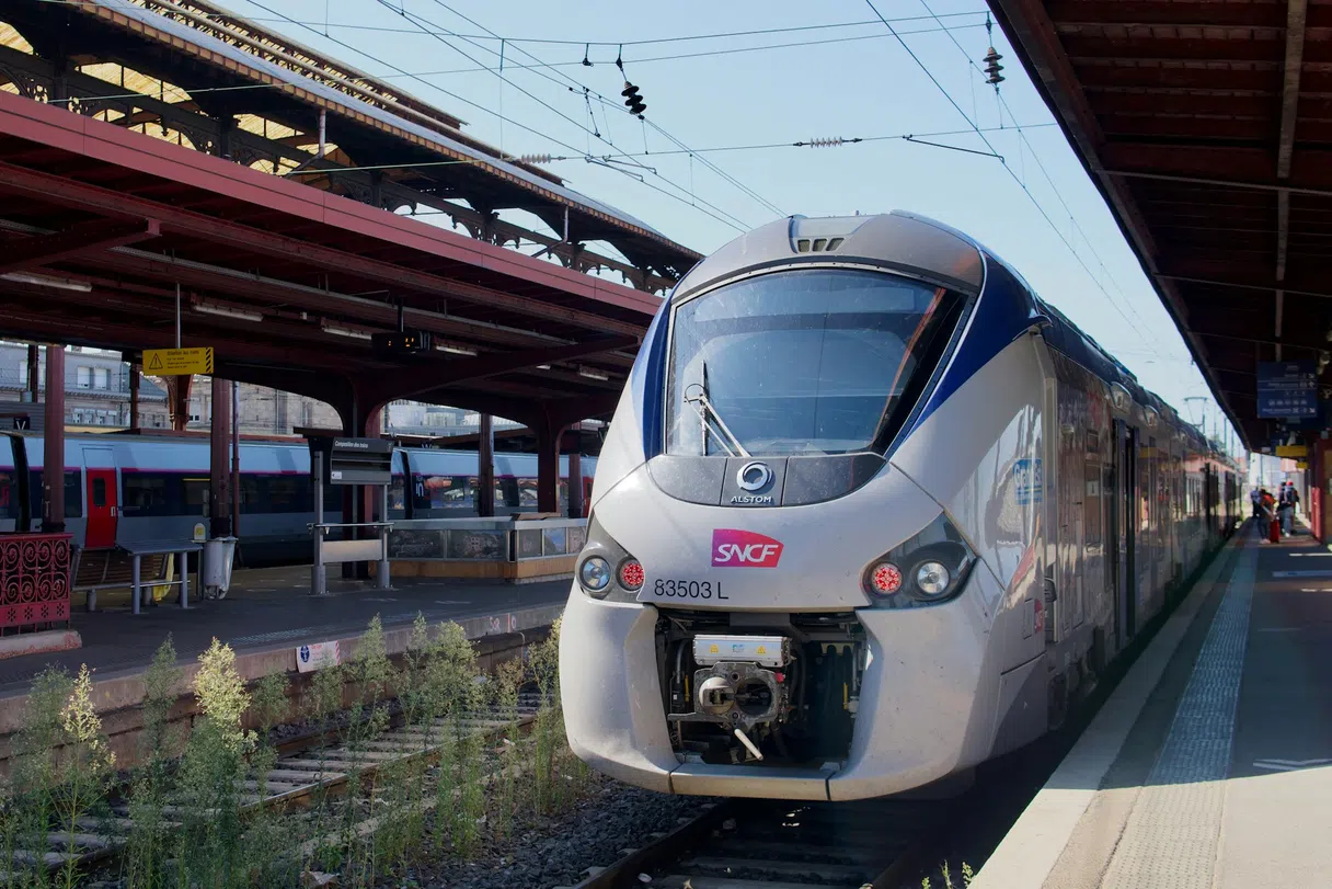 SNCF train at a French station, SNCF logo on the carriage