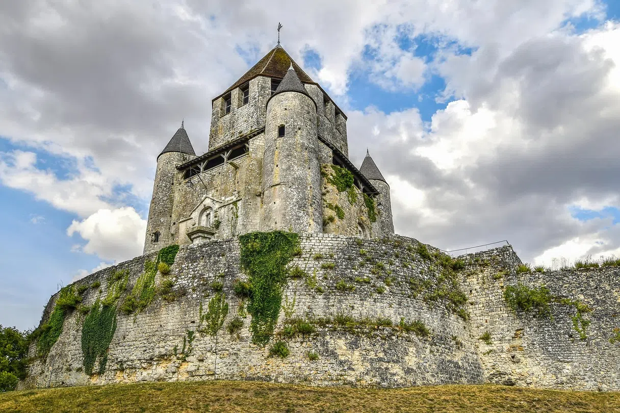 The César Tower rising above the fortifications of Provins